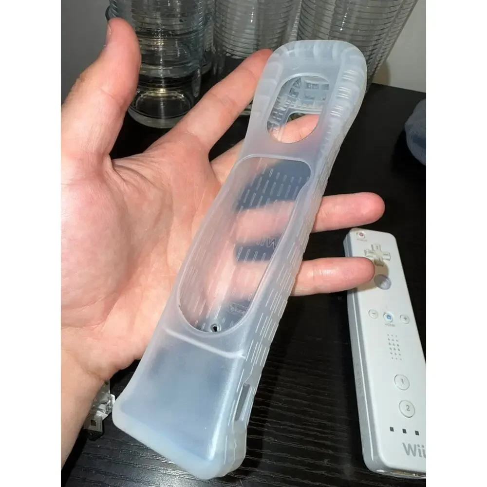 Nintendo Wii Remote with Nunchuk and Wii MotionPlus Adapter